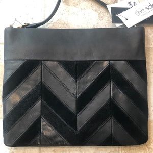 The Sak black leather croasbody